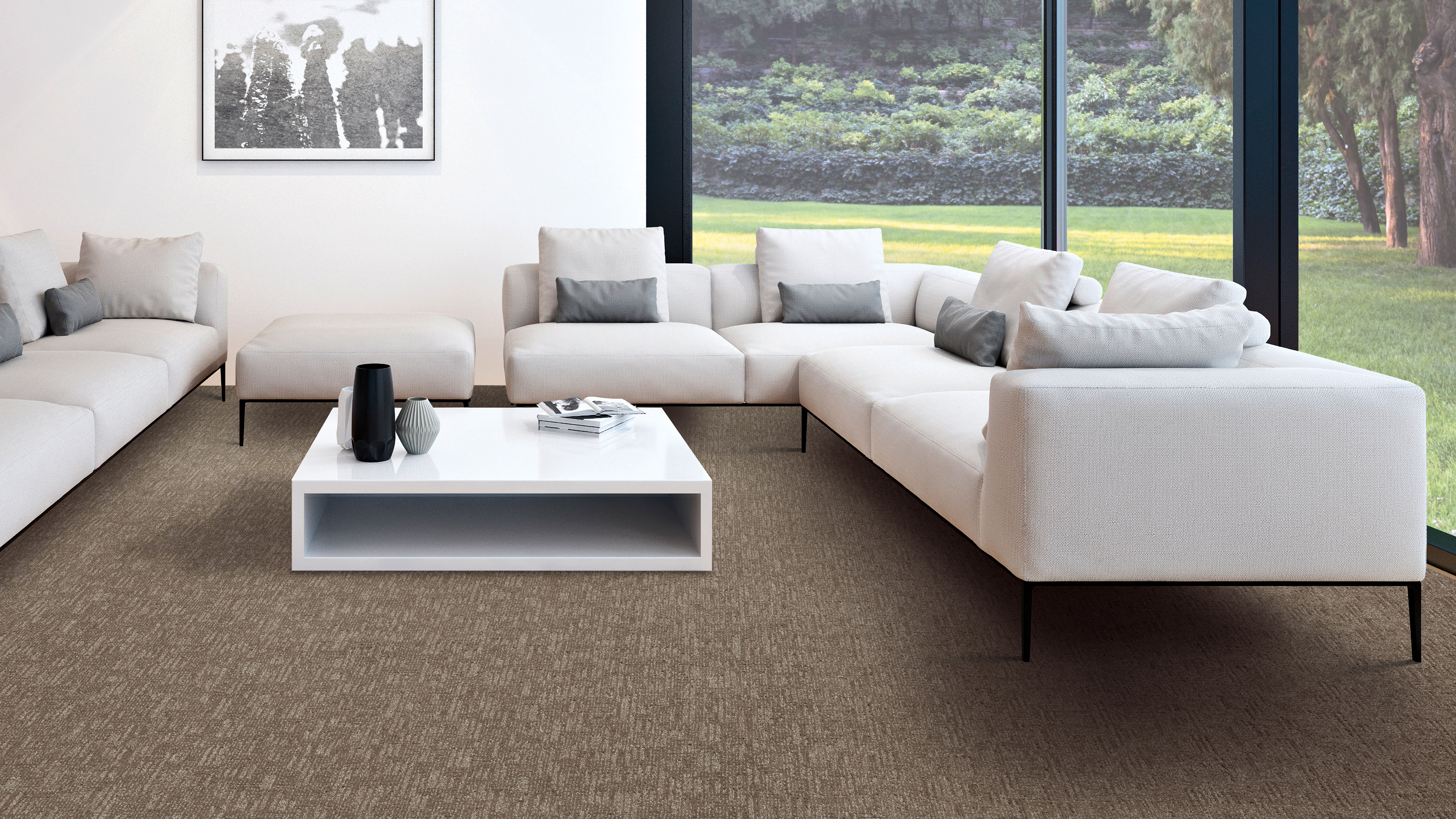 dark colored carpet with a large white sectional couch on top 